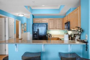 ครัวหรือมุมครัวของ Crystal Tower 1906 by Vacation Homes Collection