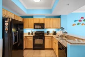 ครัวหรือมุมครัวของ Crystal Tower 1906 by Vacation Homes Collection