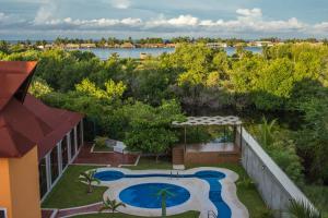 an aerial view of a resort with a swimming pool at KO'OLEBIL in Boca del cielo