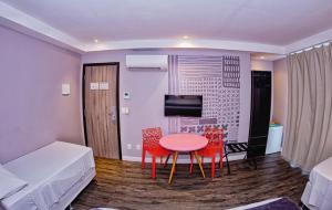 TV a/nebo společenská místnost v ubytování B Hotel Salvador