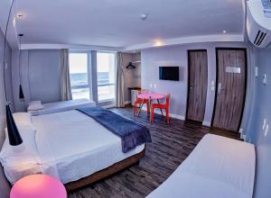 Postel nebo postele na pokoji v ubytování B Hotel Salvador