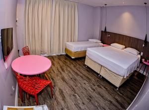 Postel nebo postele na pokoji v ubytování B Hotel Salvador