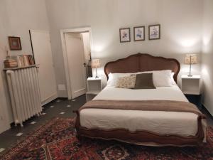 A bed or beds in a room at Dimora Caffaro