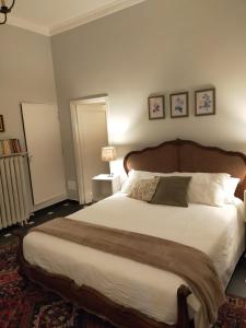 A bed or beds in a room at Dimora Caffaro