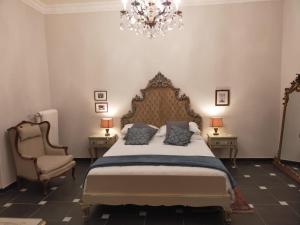 A bed or beds in a room at Dimora Caffaro