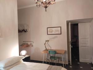 A bed or beds in a room at Dimora Caffaro