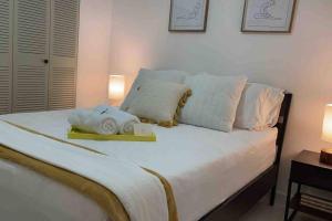 Katil atau katil-katil dalam bilik di Boquerón Beach Apartment.- Guarionex 207
