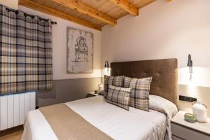 Posteľ alebo postele v izbe v ubytovaní Cerdanya Mountain Residences