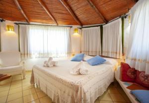 Ein Bett oder Betten in einem Zimmer der Unterkunft Cozy Studio Porto Rotondo 35 m² + Pool