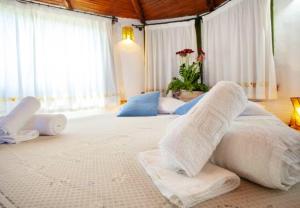 Ein Bett oder Betten in einem Zimmer der Unterkunft Cozy Studio Porto Rotondo 35 m² + Pool