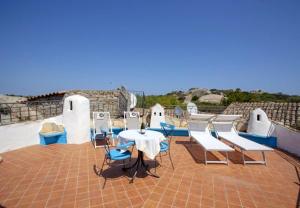 Ein Balkon oder eine Terrasse in der Unterkunft Cozy Studio Porto Rotondo 35 m² + Pool