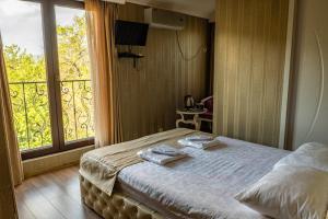 Postel nebo postele na pokoji v ubytování Villa Lata