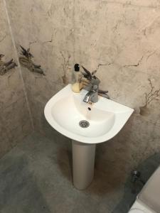 Koupelna v ubytování Guesthouse BATU