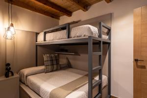 Posteľ alebo postele v izbe v ubytovaní Cerdanya Mountain Residences