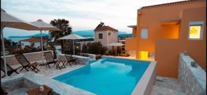 The swimming pool at or close to Dimani Suites
