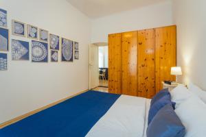 Posteľ alebo postele v izbe v ubytovaní Apartman Lussi