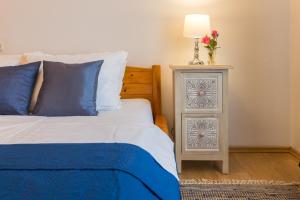 Posteľ alebo postele v izbe v ubytovaní Apartman Lussi