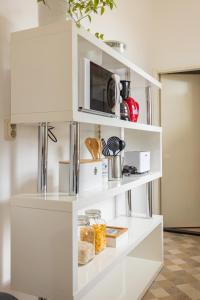 Kuchyňa alebo kuchynka v ubytovaní Apartman Lussi