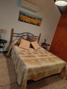 Ένα ή περισσότερα κρεβάτια σε δωμάτιο στο Mirador Vista Palacios