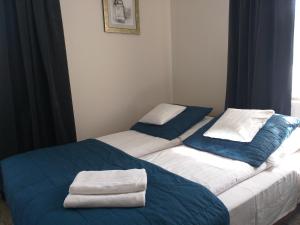 Posteľ alebo postele v izbe v ubytovaní Apartamenty i pokoje gościnne KOŁODZIEJÓWKA