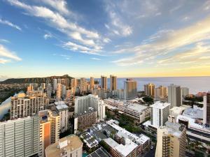an aerial view of a city with buildings at Ocean & Diamond Head View Studio at Waikiki in Honolulu