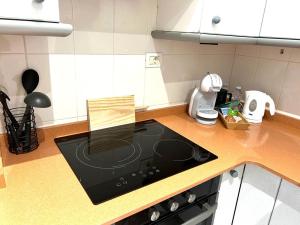 Kuchyňa alebo kuchynka v ubytovaní Appartement ‘’Los Pinos’’ 50m de la plage
