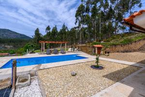 an image of a swimming pool in a house at Escolinha de France in France