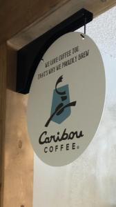 a sign on the side of a coffee shop at THE BRANSINN Entertainment District in Branson