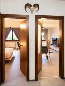 Posteľ alebo postele v izbe v ubytovaní TatryView Apartments by KingDubaj PREMIUM