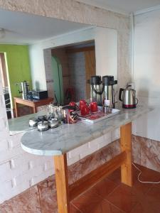 Kuchyň nebo kuchyňský kout v ubytování Residencial mi Casa