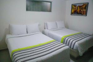 Postel nebo postele na pokoji v ubytování Donjuan By Melida Hotel