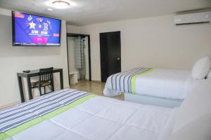 Postel nebo postele na pokoji v ubytování Donjuan By Melida Hotel