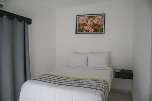 Postel nebo postele na pokoji v ubytování Donjuan By Melida Hotel