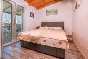 Postel nebo postele na pokoji v ubytování House Osti + 23 fotografií