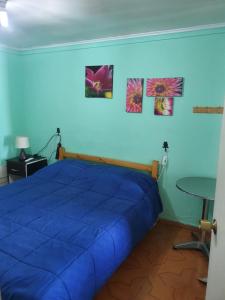 Postel nebo postele na pokoji v ubytování Residencial mi Casa