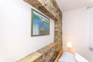 Postel nebo postele na pokoji v ubytování Apartment Luka