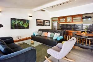 Χώρος καθιστικού στο Villa Taleona