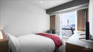Katil atau katil-katil dalam bilik di Daiwa Roynet Hotel Kagoshima Tenmonkan PREMIER - former Daiwa Roynet Hotel Kagoshima Tenmonkan