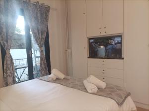 Posteľ alebo postele v izbe v ubytovaní Elegant Apartment