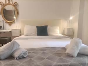 Posteľ alebo postele v izbe v ubytovaní Elegant Apartment