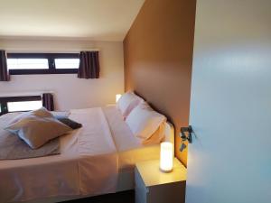 Postel nebo postele na pokoji v ubytování Habitaciones en Finca Olivo y Almendro