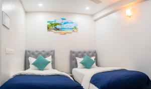 Postel nebo postele na pokoji v ubytování Tour Inn