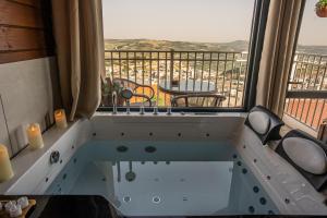 Balkón nebo terasa v ubytování ארואד סוויטס Arwad suites