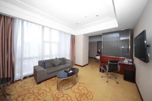 Televiisor ja/või meelelahutuskeskus majutusasutuses Shenzhen Avant-Garde Hotel