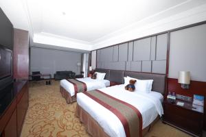 Televiisor ja/või meelelahutuskeskus majutusasutuses Shenzhen Avant-Garde Hotel