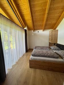 Ένα ή περισσότερα κρεβάτια σε δωμάτιο στο Chata LINDA +13 φωτογραφίες
