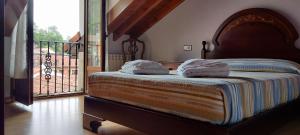 Katil atau katil-katil dalam bilik di Apartamentos Rurales La Quintana