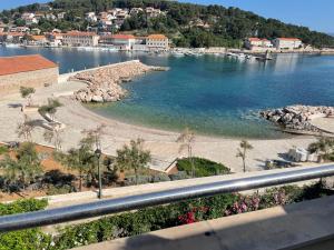 a view of a body of water with a beach at JELSA center-Sea view apartment near the beach - B2 in Jelsa