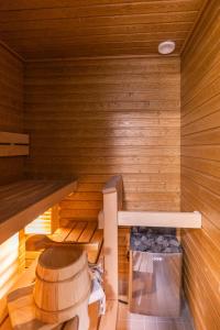 an inside view of a sauna with a bench at Arctic Starry City Suite in Rovaniemi