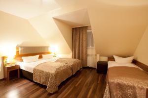 Hotel Frankfurt Messe客房内的一张或多张床位
